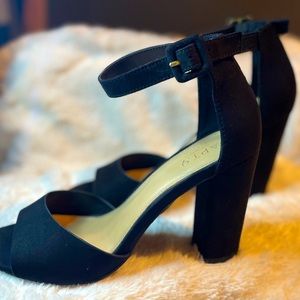 Barley worn block open toe heels.